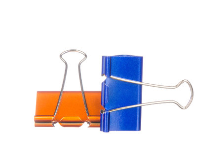 Orange and blue paper clips isolated on white backgroundの写真素材