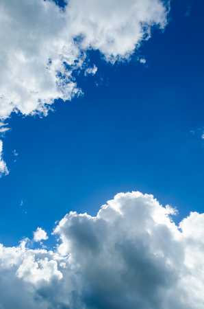 Blue sky with cloudsの写真素材