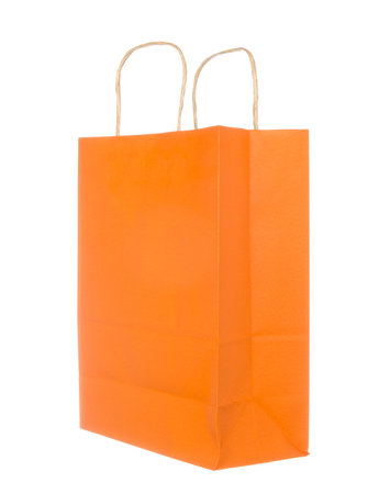 Empty orange paper bag isolated on white backgroundの写真素材