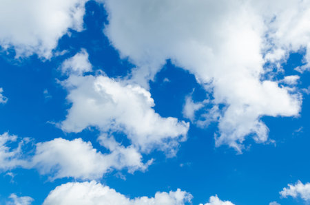 Blue sky with cloudsの写真素材