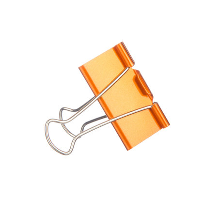 Orange paper clip isolated on white backgroundの写真素材