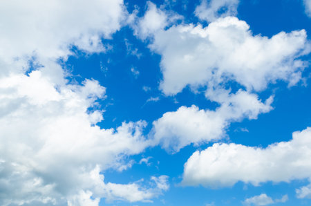 Blue sky with cloudsの写真素材