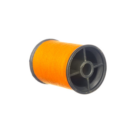 Colourful orange thread isolated on white backgroundの写真素材