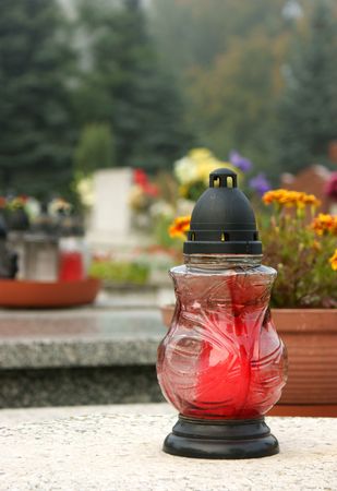 Cementery candle on grave in All Souls' Dayの写真素材