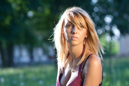 Beautiful young woman outdoor in summerの写真素材