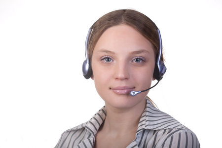 Close-up face of smiling woman in headphones on a white background 