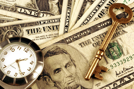 Time And Money - a watch and skeleton key above US currency