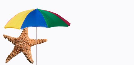 Summer Vacation - Umbrella and Starfishの写真素材
