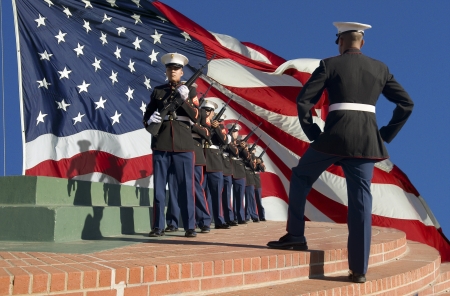 USMC Ceremonial Rifle Squad near a large American flagのeditorial素材