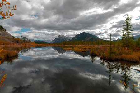 A view across Vermilion Lakes towards Mount Rundle and the town of Banff. Banff National Park, Alberta, Canada.の写真素材