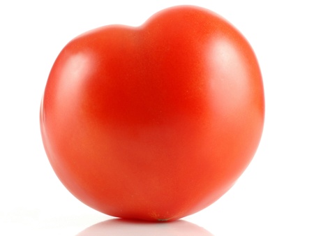 isolated big red tomato in white backgroundの写真素材