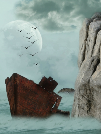 rusty ship in the ocean with a cliffの写真素材