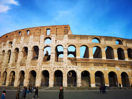 Rome, Italy - December 19th 2018: the Colosseum of Rome, also known as Flavian Amphitheater. On the second part of the day there are less tourists wanting to visit the symbol of Rome.のeditorial素材
