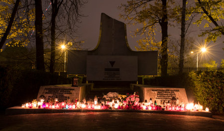 Warsaw, Poland - November 11th 2020: National Independece Day of Poland. Candles and flowers in an...