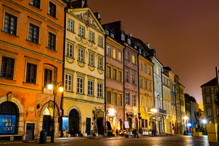 Warsaw, Poland - November 17th 2020: Central Square in Warsaw Old Town. Small colorful houses...