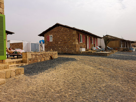 Espingueira, Cape Verde - February 12th 2019: old stone houses, a chilling tourist and cozy hotel...