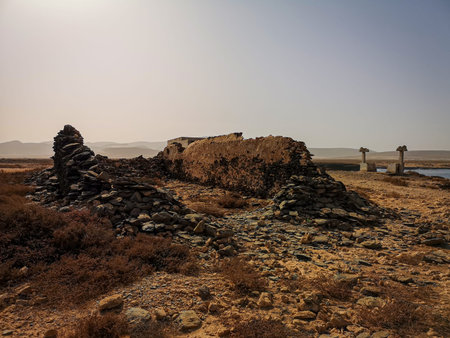 Old wall ruins in a desert. Hot arid weather on African Island of Boa Vista, Cape Verde. Sunny day...