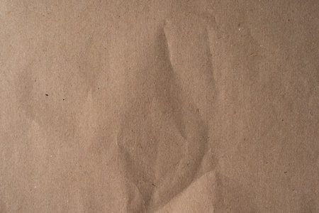 Abstract brown recycled paper texture for background. Old kraft paper box craft pattern. top view image for designの写真素材