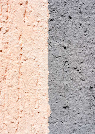 Texture, wall, concrete two colors, gray and pink, can be used as a background Wall fragment with scratches and cracks, macro view in high resolution, Pink and gray color cement wall textureの写真素材