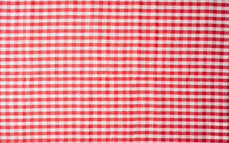Red gingham tablecloth often found in diners and cafes a popular traditional covering for tables where food is consumedの写真素材