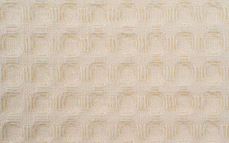 White bath towel waffle macro texture background, Waffle weave kitchen or hand towels, home textile close up. top viewの写真素材
