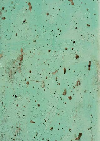 Seamless grunge texture. Old weathered rusty concrete wall cracked and peeling off paint. Old green paint metal plate texture backgroundの写真素材