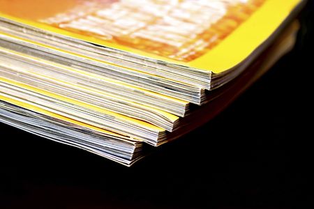 Each other six newspaper done black background.の写真素材