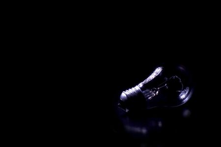 Lamp bulb black background isolate..の写真素材