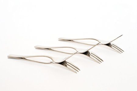 Six forks isolated on white background.の写真素材