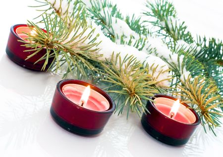 Christmas, red candles and pine branches.の写真素材