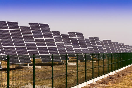 Modern solar power plant in the sunny plain.