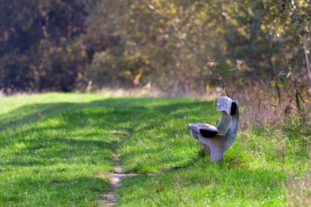 Bench in the open air, stone and wood の写真素材