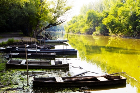 Old wooden barge on the lake の写真素材