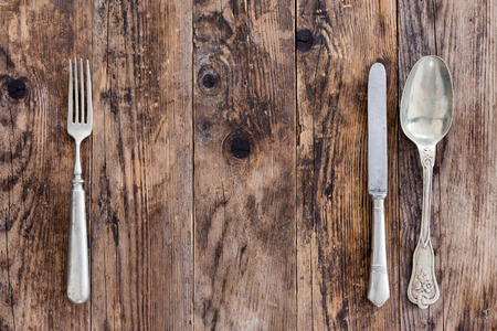Wood background old cutlery together.の写真素材