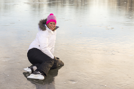 Young girl skater on the ice.の写真素材