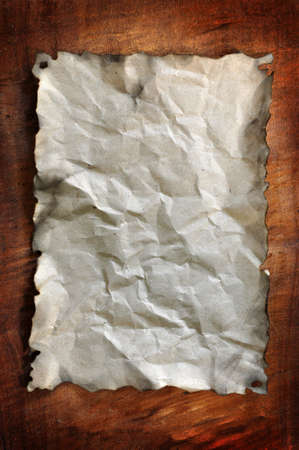 burned paper was placed on the wooden board for designsの写真素材