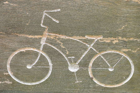 bicycle sign on the wood boardの写真素材