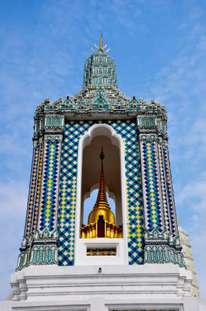 golden bell tower at the emerlad buddha temple - bangkok , thailandの写真素材