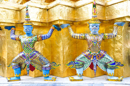 thai demon sculptures in the Emerald Buddha temple - Bangkok, thailandの写真素材