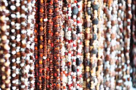the bead necklaces are hanging for selling