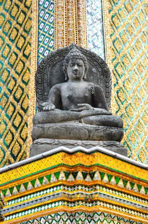 the stone buddha at the emerald buddha temple - Bangkok ,thailandの写真素材