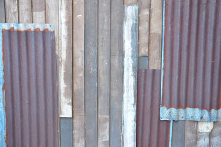 the texture of tin and wood wallの写真素材