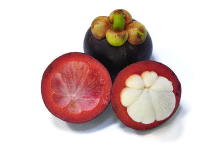 The Mangosteen, a delicious tropical fruit called as the queen of fruitsの写真素材
