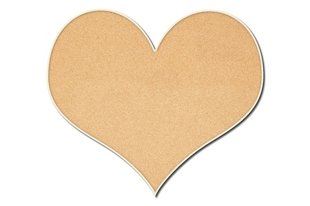 A cork board in the shape of a heart.の写真素材