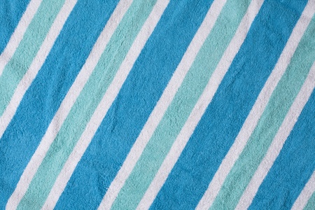 Cool color beach towel background with diagonal lines. の写真素材