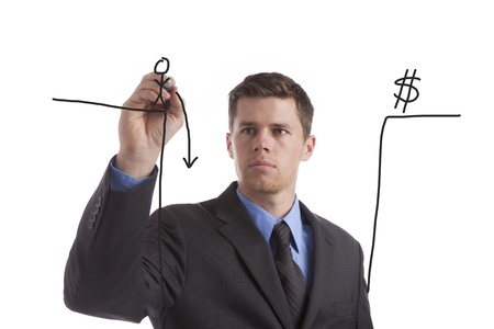 A young, tired businessman draws his idea of the coming fiscal cliff. の写真素材