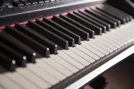 A piano keyboard is shown close up and fades into the background の写真素材