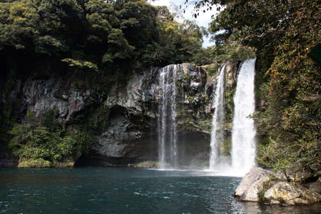Cheonjiyeon Waterfall on Jeju Island in South Koreaの写真素材