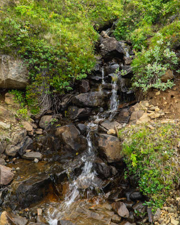 Tiny Roadside Waterfall on the Icelandic Ring Roadの写真素材