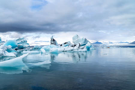 Icebergs Floating in a Large Lagoon in Icelandの写真素材